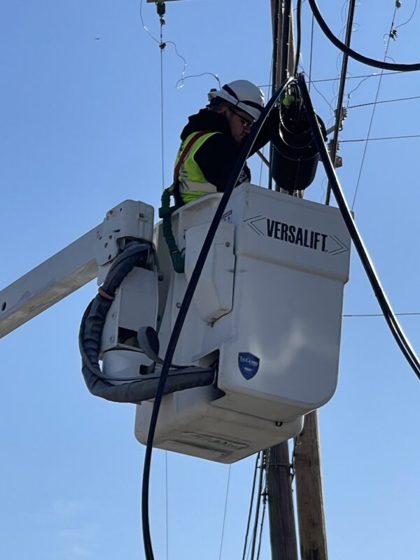 Treton Fiber Technician Utilizing Versalift Bucket